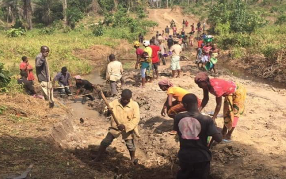 Zota District residents build road